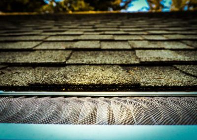 A close up of a metal roof vent for roofing.